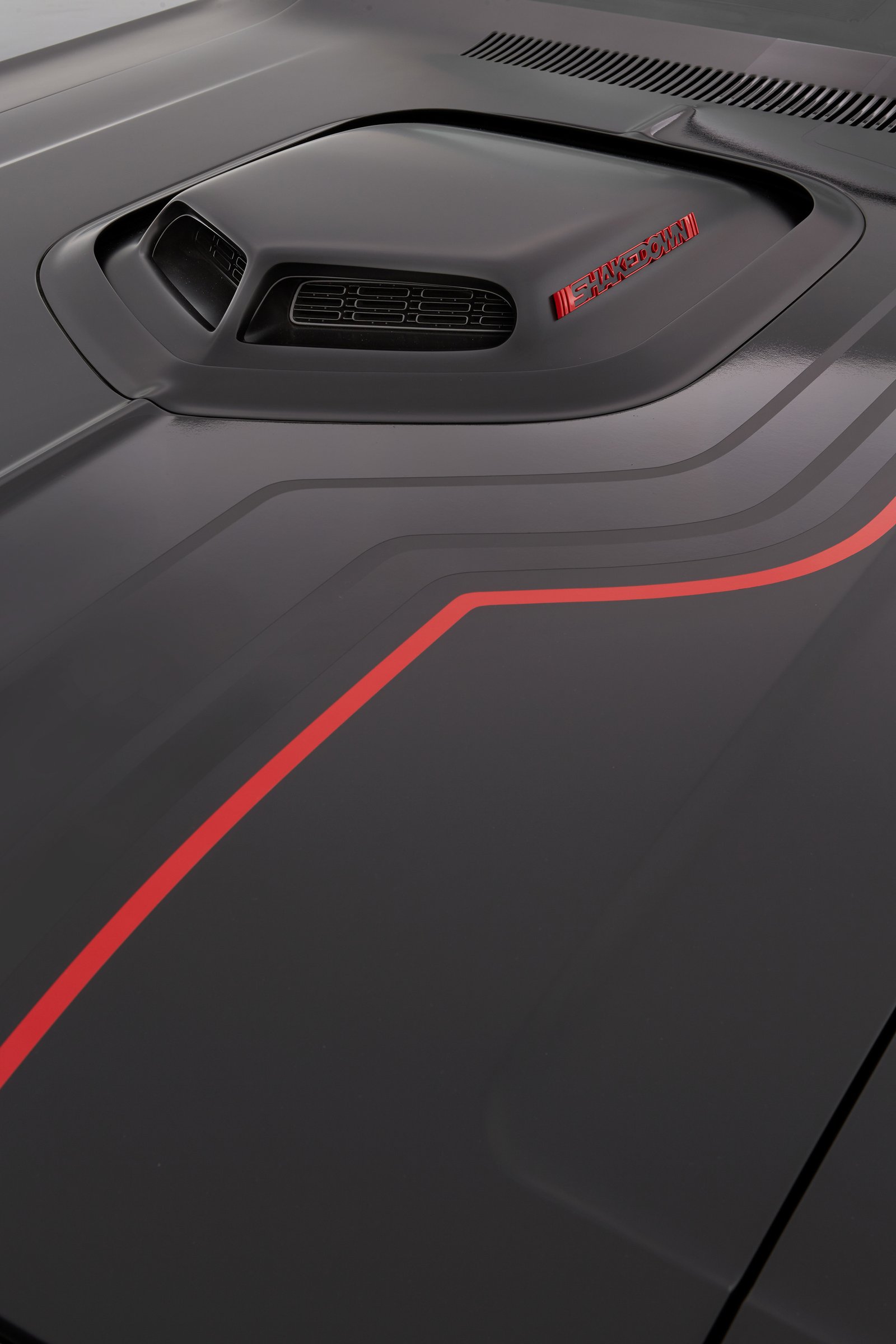 The Shaker hood scoop is accented on top with a black “Shakedo Mopar