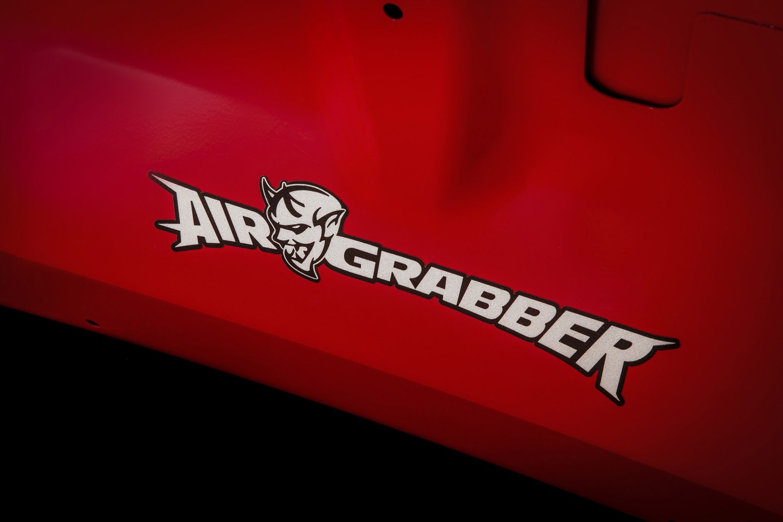 The Air Grabber logo on the underside of the hood of the 2018 Do